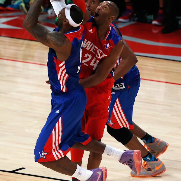 Kobe Bryant #24 of the Los Angeles Lakers and the Western Conference blocks the shot of LeBron James #6 of the Miami Heat and the Eastern Conference during the 2013 NBA All-Star game at the Toyota Center on February 17, 2013 in Houston, Texas.