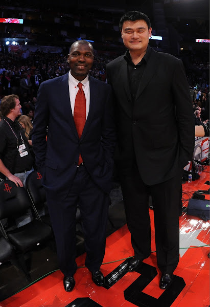 NBA Legends Hakeem Olajuwon and Yao Ming stand courtside during the 2013 NBA All-Star Game presented by Kia on February 17, 2013 at the Toyota Center in Houston, Texas. 