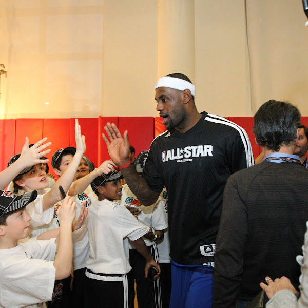 LeBron James #6 of the Eastern Conference All-Stars high fives fans before the 2013 NBA All-Star Game on February 17, 2013 at Toyota Center in Houston, Texas.